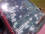 Machine gun rounds on car windshield