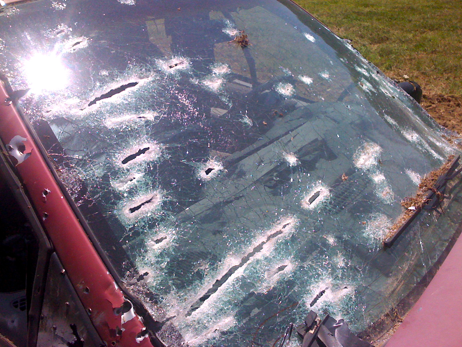 Machine gun rounds on car windshield
